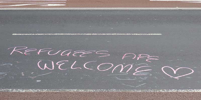 refugess welcome - Newtown grafitti via flickr (CC-BY-2.0)